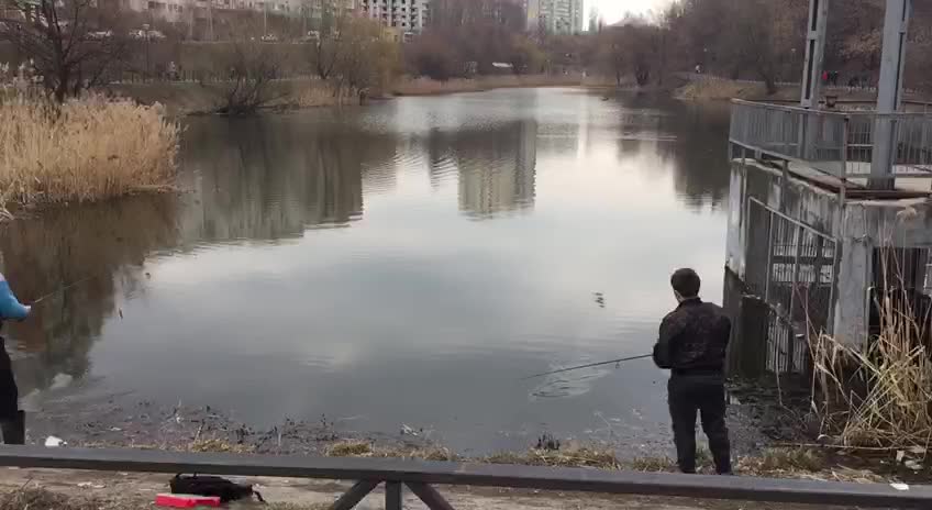 Two men have a great catch on the river