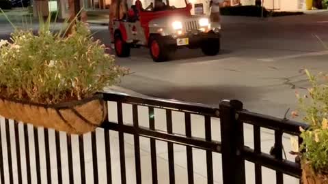 T-Rex's Chase Jeep Through Town