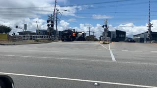 Tow Truck Picks Up SUV From Train Tracks