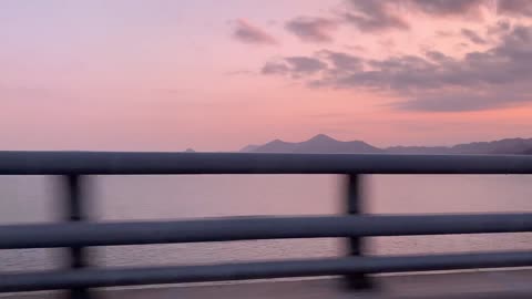 a car running on a bridge