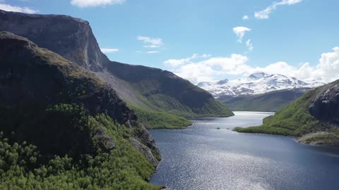 Flying over a lake in the mountains