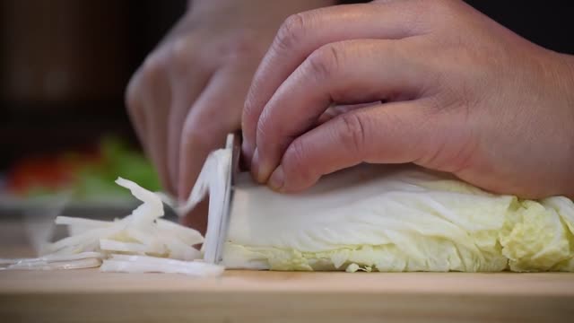 Professionally cut cabbage to prepare a delicious salad