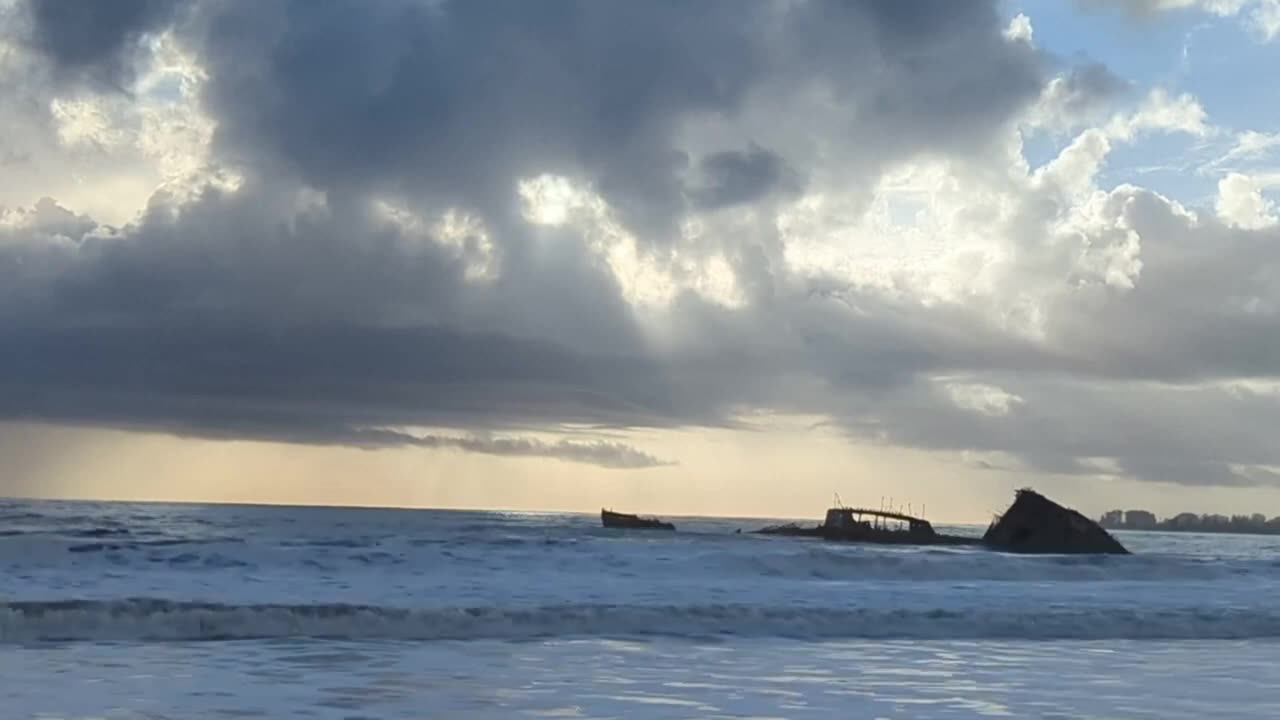 Shipwreck with Dark Clouds