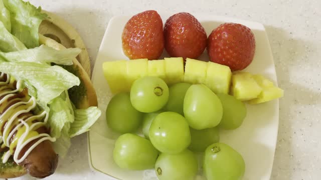 Delicious hamburger and fruit