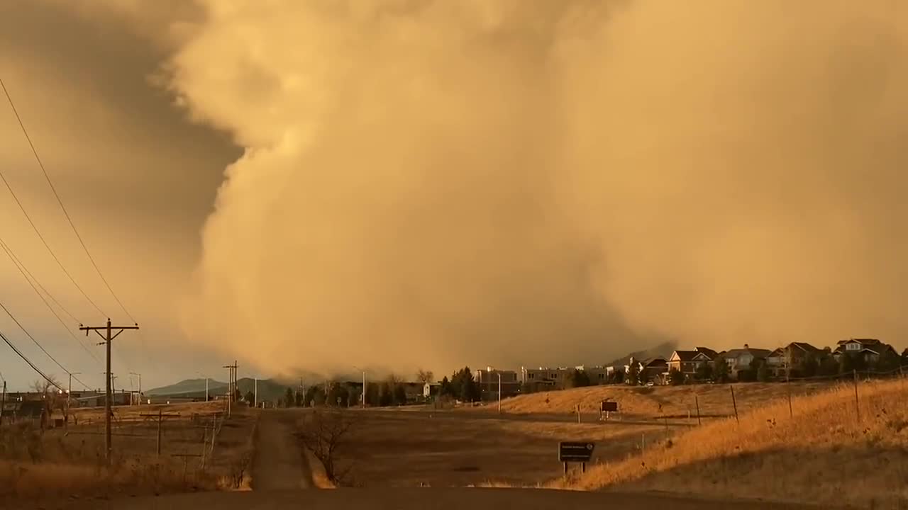 An apocalyptic winter storm front swallowing Boulder, Colorado