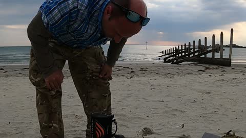 Cooking a meal in the JETBOIL. At a beach. 3rd Oct 2022