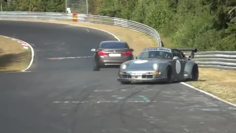 The racer drifts to show off his skills