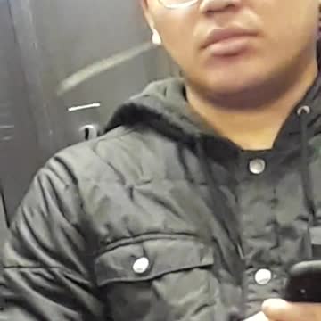 Person recording accidentally turns on flash, records guy with big hair