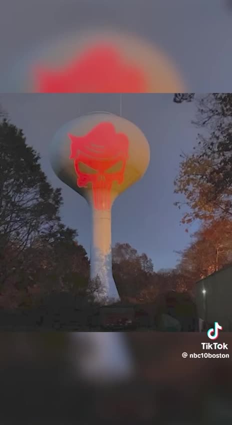 "Punisher" Trump image projected onto water tower