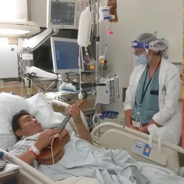 Doctor sings ukulele duet with her patient
