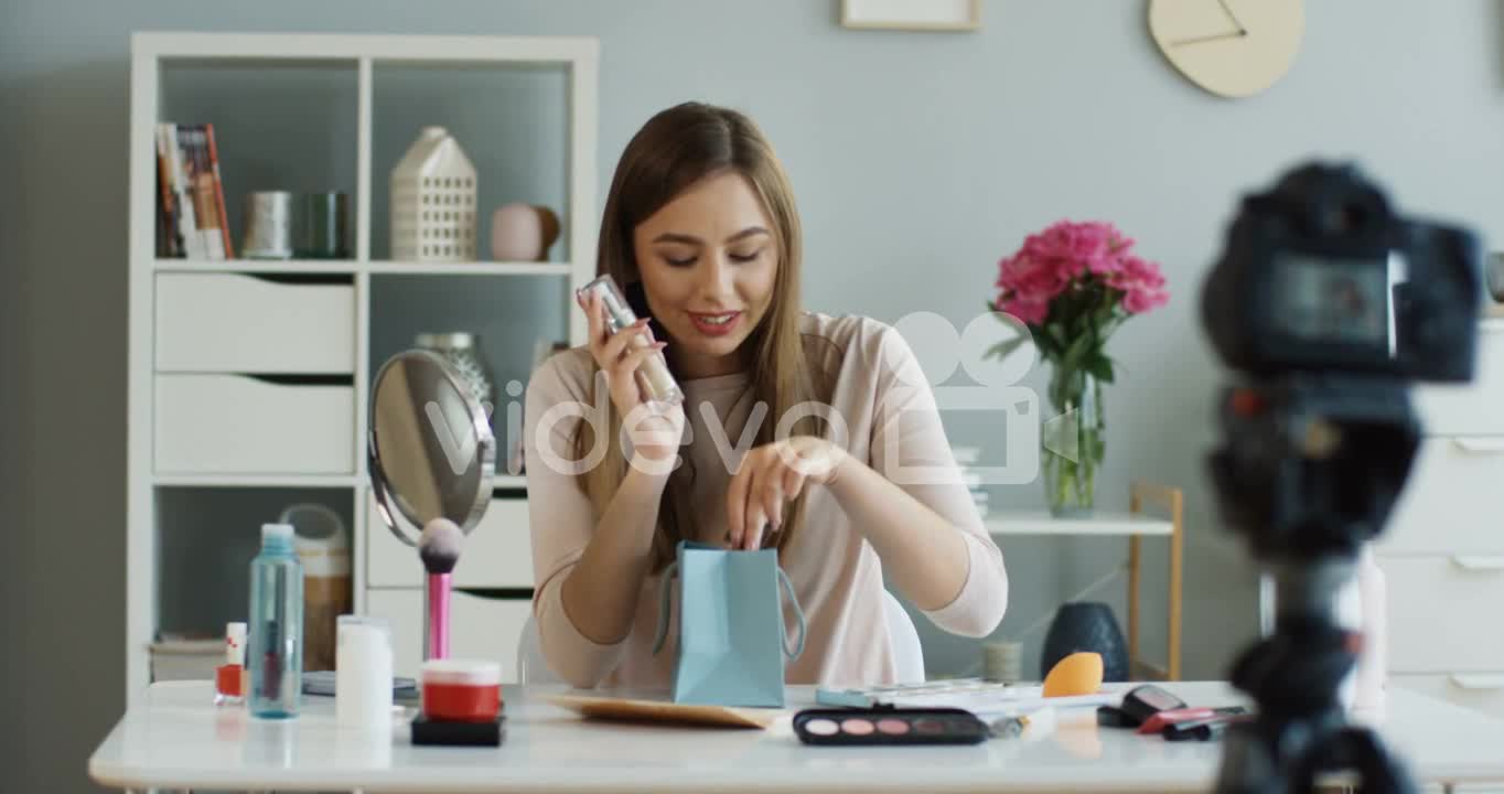 Young Fashion Blogger Recording Video While Talking About Makeup And Cosmetics To Her Followers