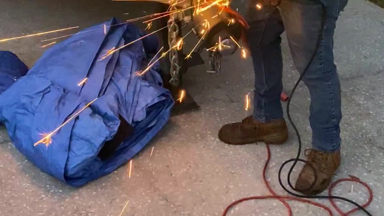 Roofer sharpens his pitchfork!