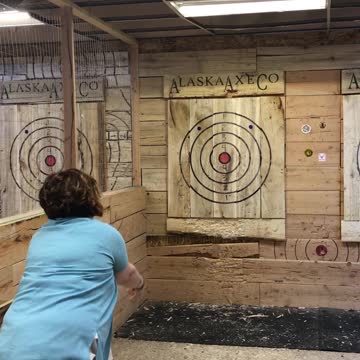 My wife throwing an ax!