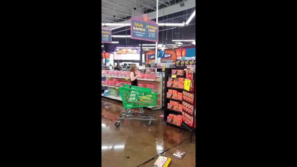 Woman throws groceries across store after being told to wear a mask