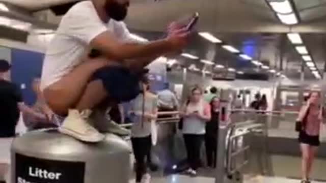 Men and women let this man shit in front of them in the subway