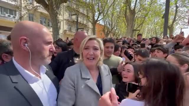 Crowds greeting Marine Le Pen, never seen anything like this for Macron, the tide is turning.