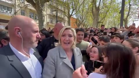 Crowds greeting Marine Le Pen, never seen anything like this for Macron, the tide is turning.
