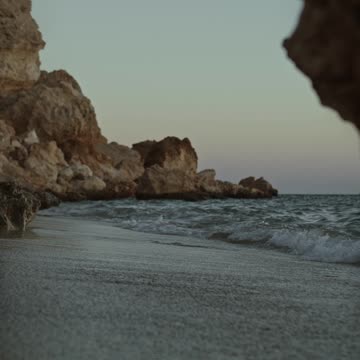 Sea Waves Crashing The Cliff Coast