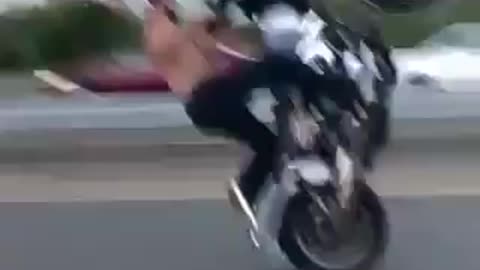 Dangerous bike stunts on road