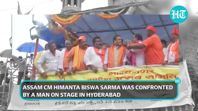 Drama at Assam CM's rally_ Man storms stage, snatches mic amid chaotic scenes in Hyderabad