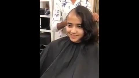 Cute Girl shave her head at man salon