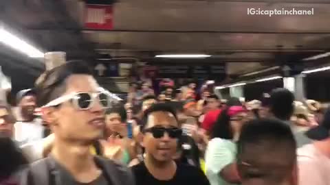 Crowd jumping cheering party underground subway station