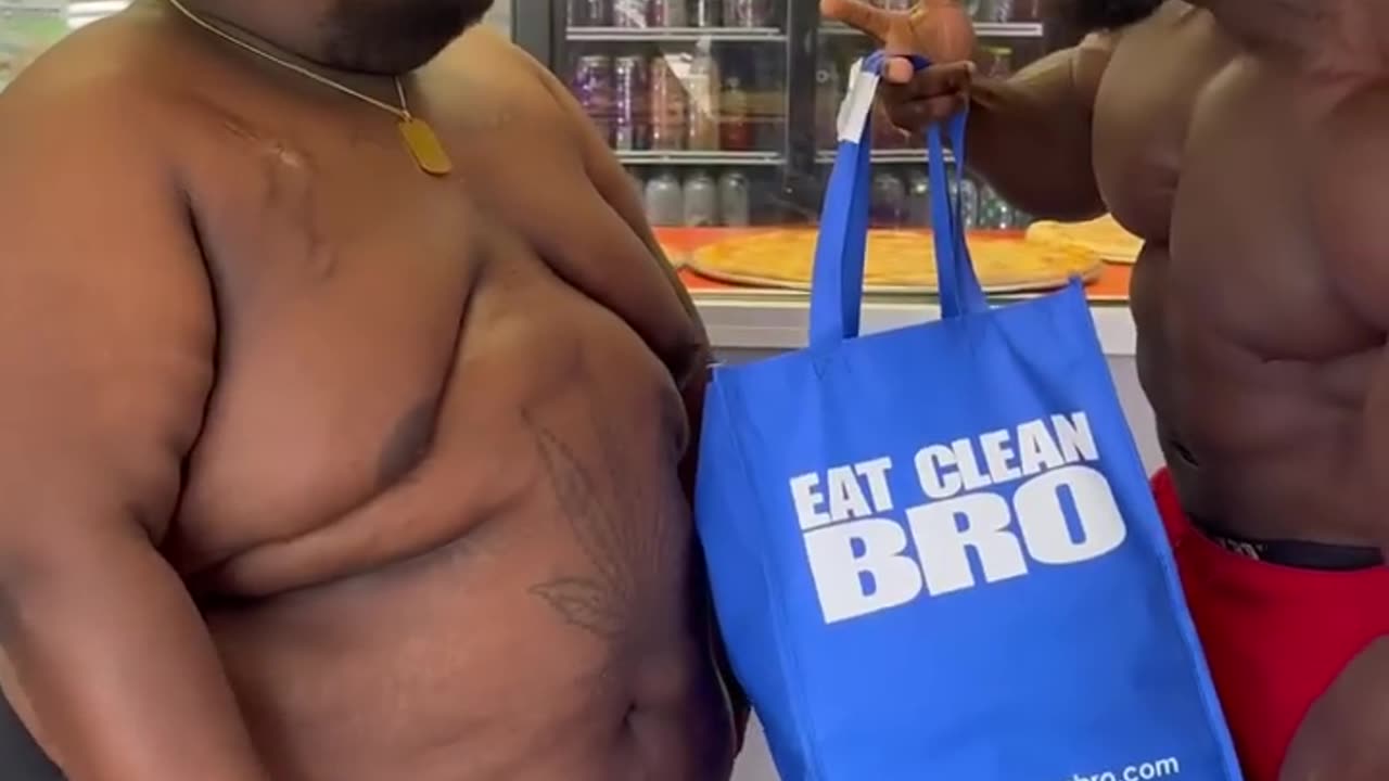 Fatty guy eating Fast food in front gint gym Trainer