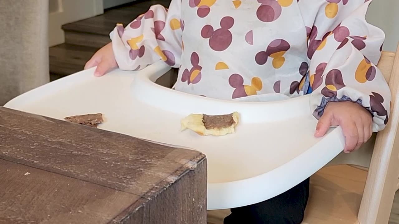 Snoozing on the High Chair