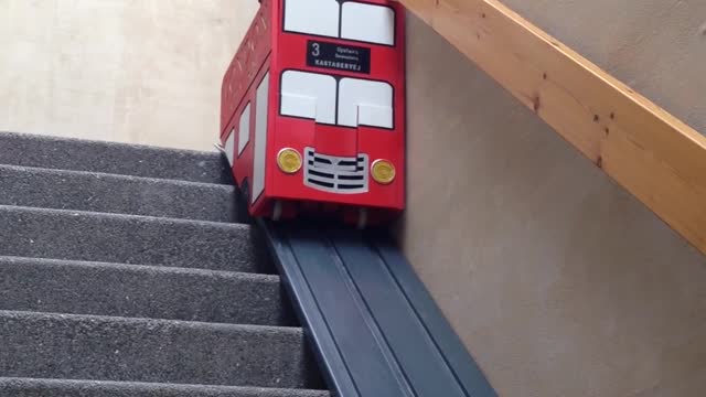 Dog takes the stair lift