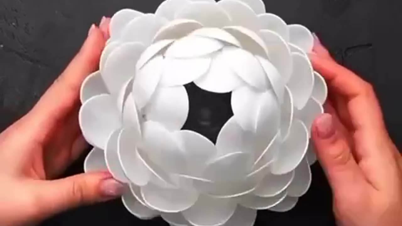 Beautiful lamp made of disposable spoons