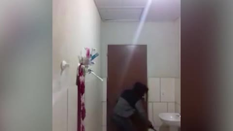 Chasing a rat in bathroom