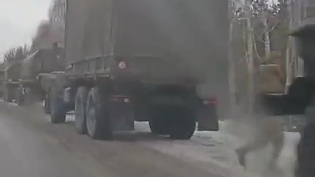 Russian military convoy just 9 miles from the Ukrainian border, just outside of the town of Valuyki.