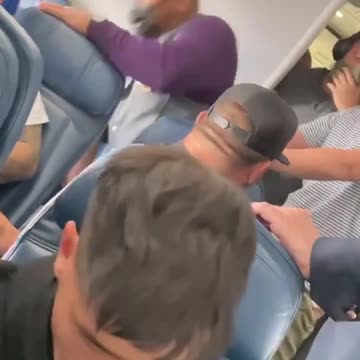 Man Tries to Hijack Plane, Ends Up Face Down in Zipties After Throwdown with Flight Attendant