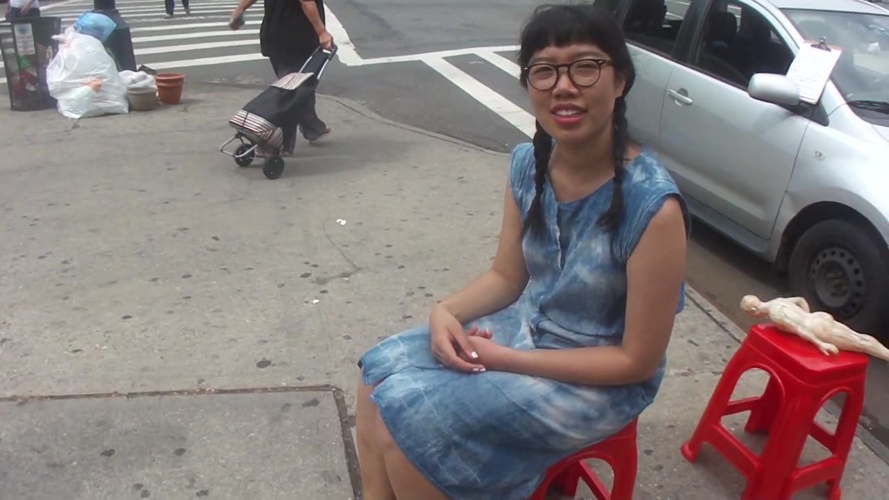 Luodong Massages Cute Chinese Woman On Sidewalk