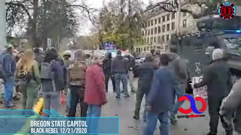 Salem Rally Ends With A Broken Window And AntiFa Filmers Getting Saved By Villain H/T Black Rebel