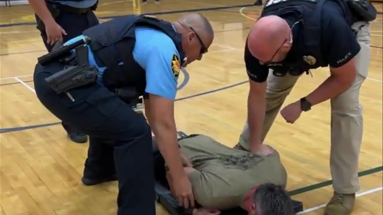 A school resource officer at Snow Canyon Middle School in St.