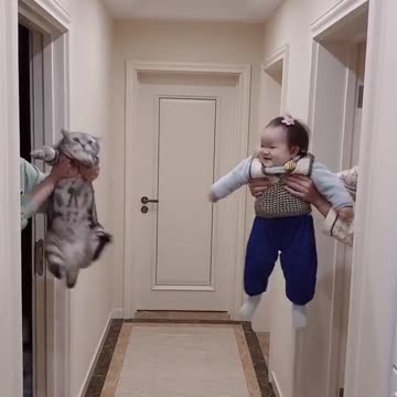 The cute baby vs cute cat