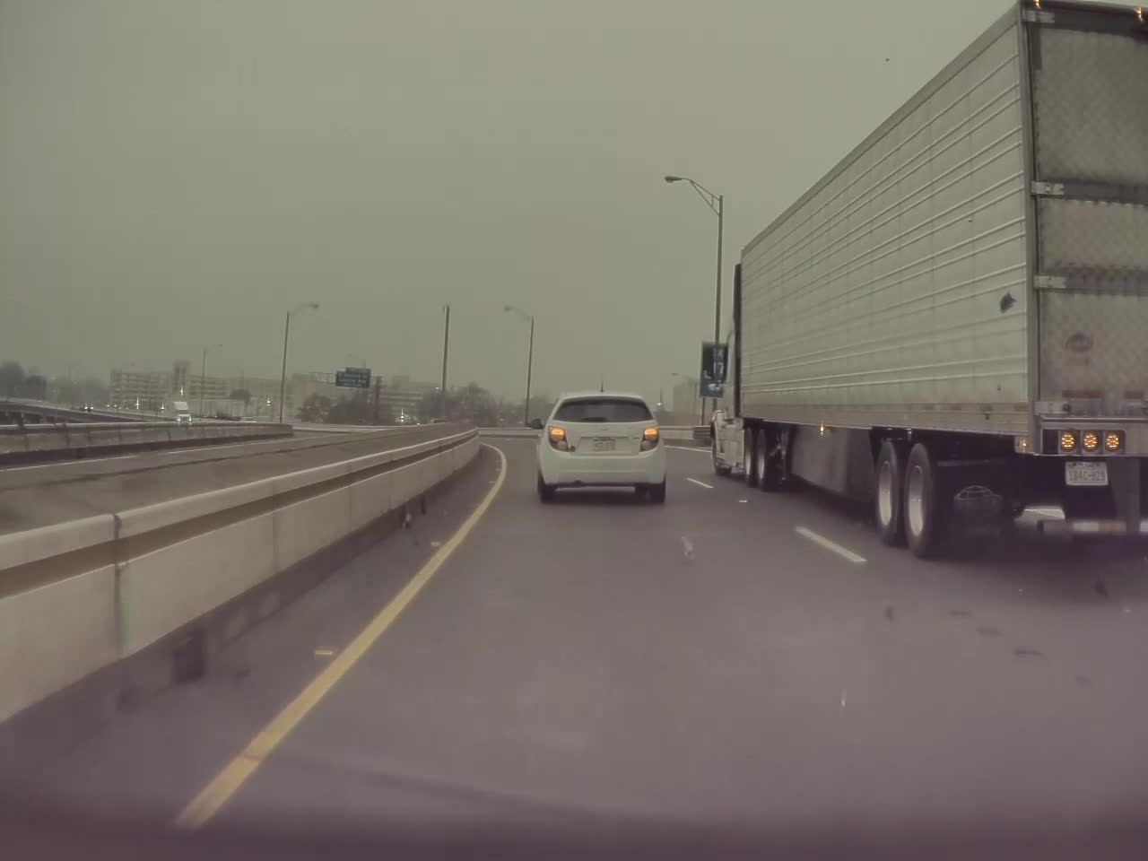 Speeding Car Smashes Mirror Weaving Through Traffic