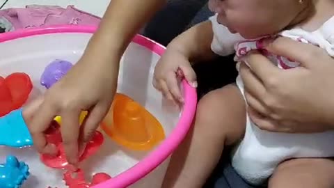 Baby play in tap