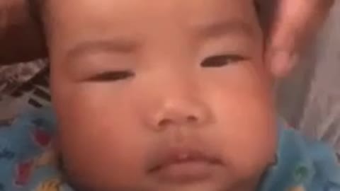 funny video of chubby baby, cheek massage