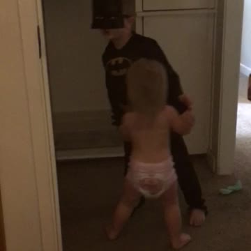 Big brother dancing with lil sister