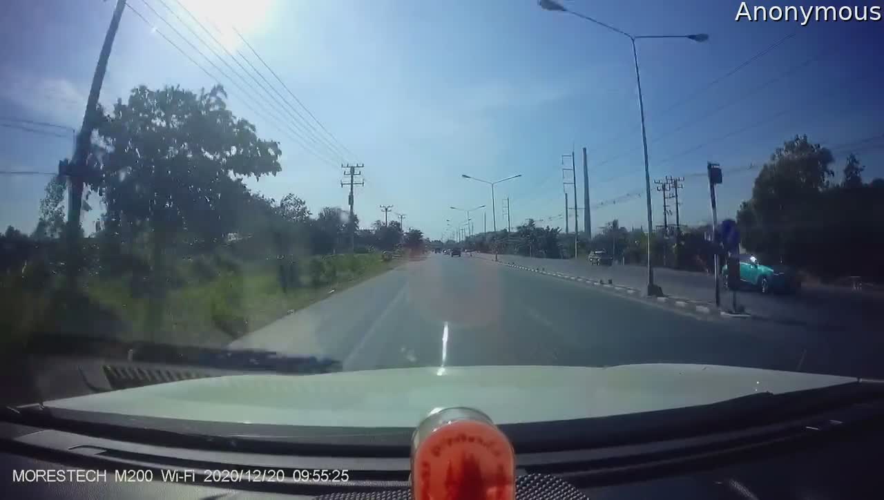 Speeding Car Spins Out Down Road