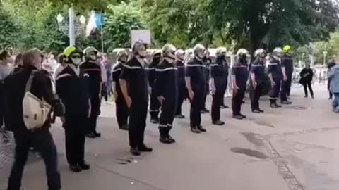 Strasbourg, France. Firefighters put their helmets on the floor