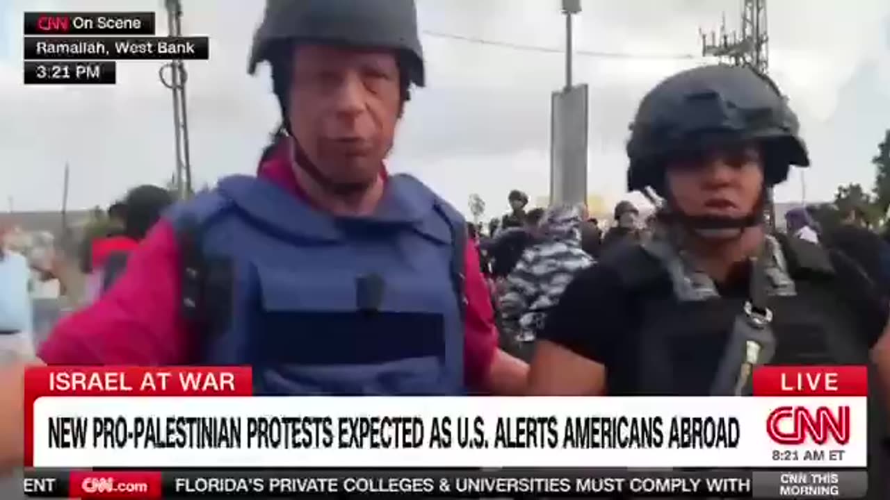 "You are not welcome here, genocide supporters! F*** CNN!"