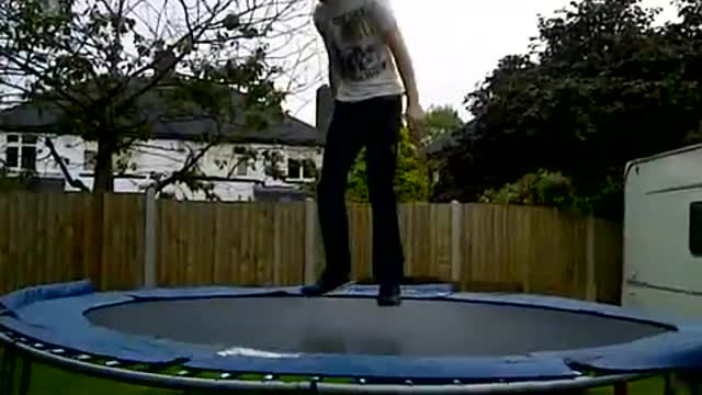 White shirt backflip trampoline head