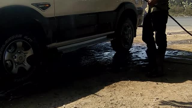 Mahindra scorpio washing