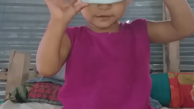 Funny scene when the kid was playing with a hat.