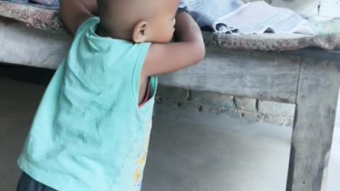 A little girl having fun in her house