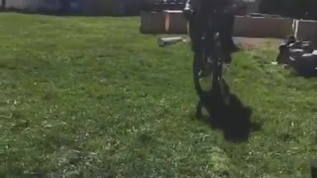 Black tank top bike faceplant