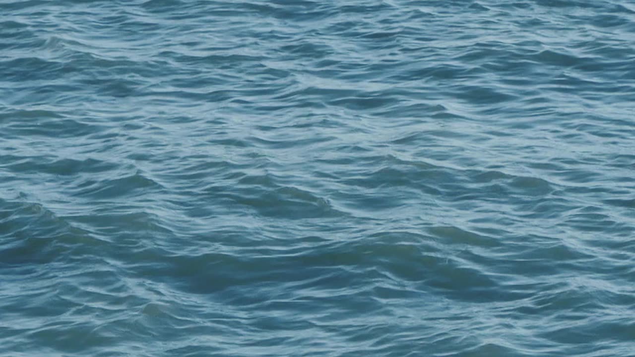 a boat at sea in slow motion